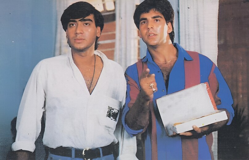 Akshay Kumar Ajay Devgn 90s Era, Suhaag Movie Box Office Success, Bollywood Action Superstars History, Akshay Kumar Ajay Devgn Friendship, Best On-screen Duo Bollywood, अक्षय कुमार अजय देवगन 90s, फिल्म सुहाग ब्लॉकबस्टर, बॉलीवुड के धुरंधर एक्टर, अक्षय बनाम अजय बॉक्स ऑफिस, सूर्यवंशी कॉप यूनिवर्स